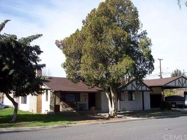 Front of home 9785 Sharon Av, Rvsd.
