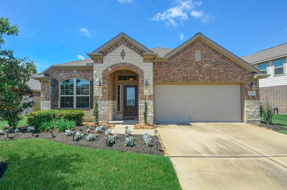 Lovely Lennar Home with stone and brick elevation.