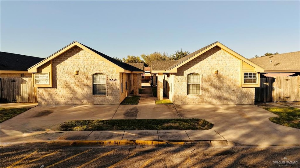 View of front facade featuring brick siding