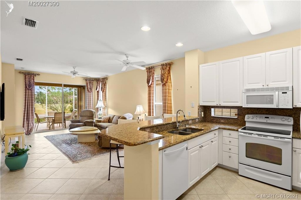 Kitchen view & family room.