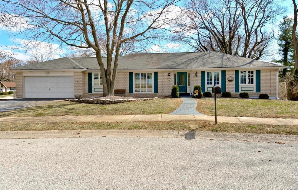 Beautiful ranch with brick front sitting on almost