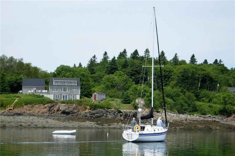 View of house facing bay with two...