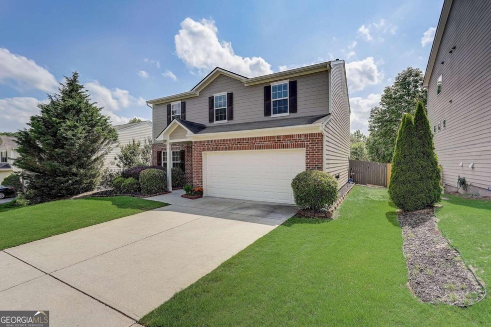 6584 Barker Station Walk, Sugar Hill, GA 30518 - photo 1