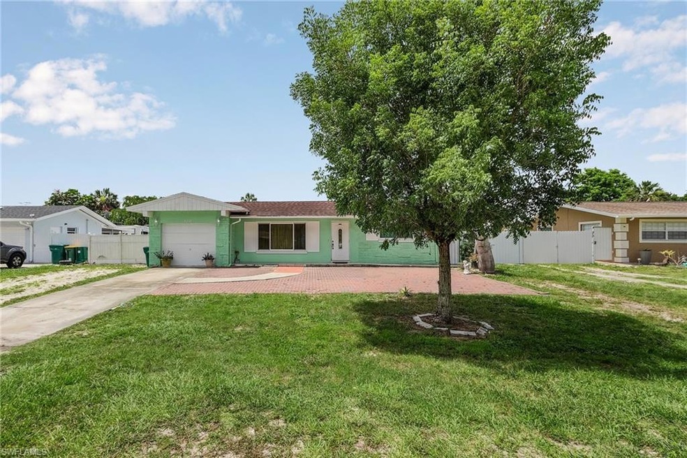 FRONT OF HOUSE WITH LARGE COURTYARD