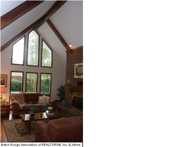 From the foyer greeted with a cozy den and nice br