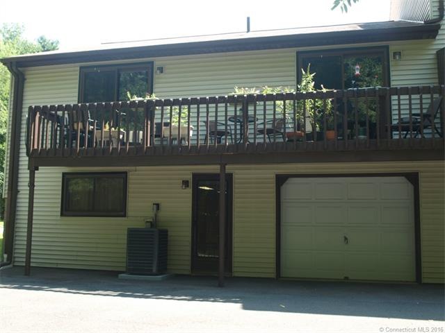 Relax on the 24' long balcony. This ranch style co