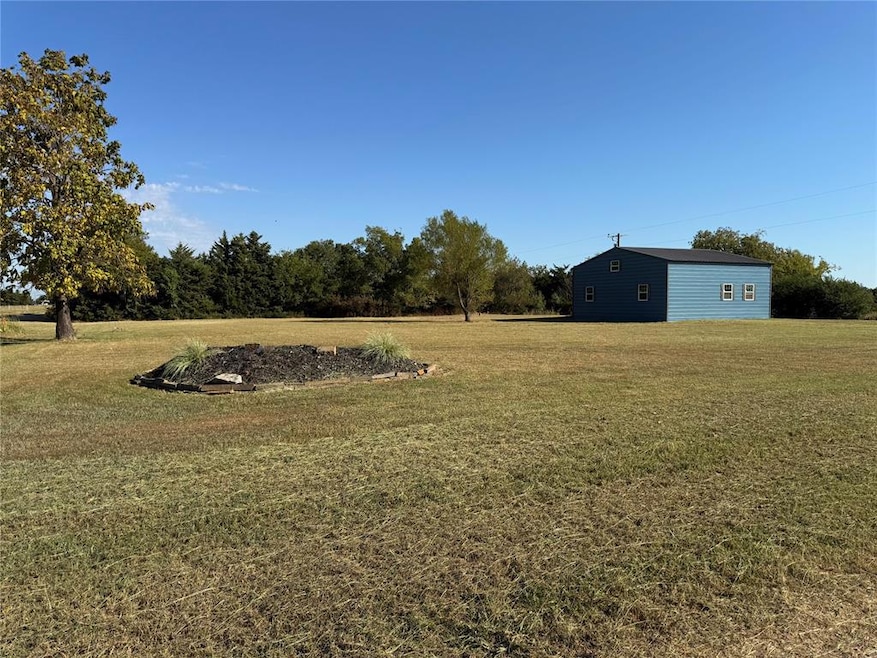 910 N Main St, Tryon, OK 74875 - photo 1