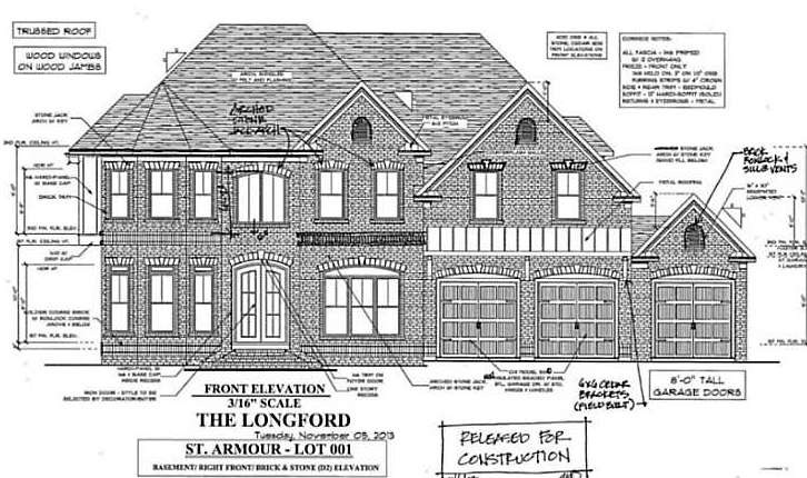 Exterior Front. 4 sides brick with stone accents, 