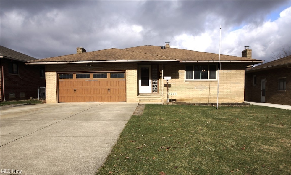 View of front of house with 2 car garage