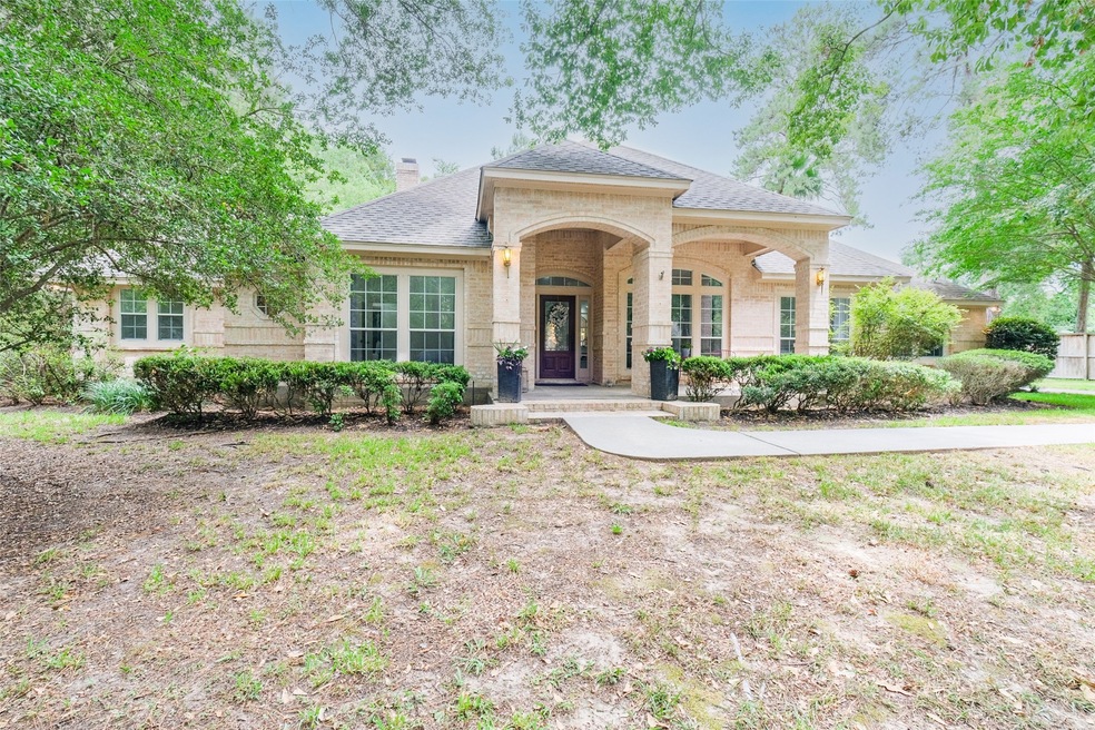 31106 Lost Creek Ct, Tomball, TX 77375 - photo 1