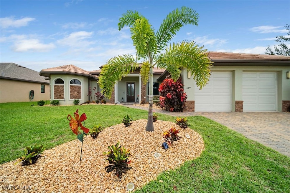 View of front of property with a garage and a fron