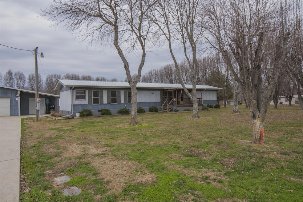 Insulated/gabled metal Roof, gutter, boxed in soffits, double pane tilt wood windows, wood blinds, sheet rock walls. 