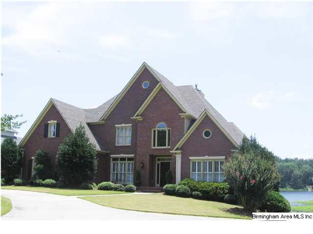 Beautiful brick home with 124 ft. water frontage o