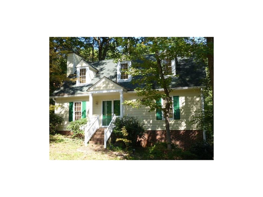 Adorable Cape Cod on over 5 acres in sought after 