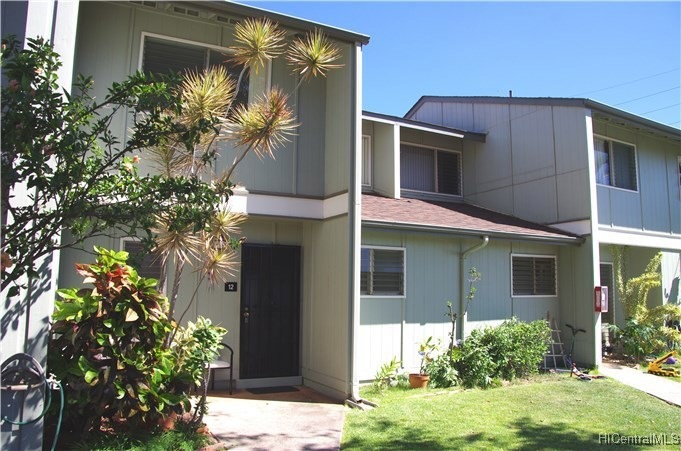 Front view of property. Lot's of shade from the af