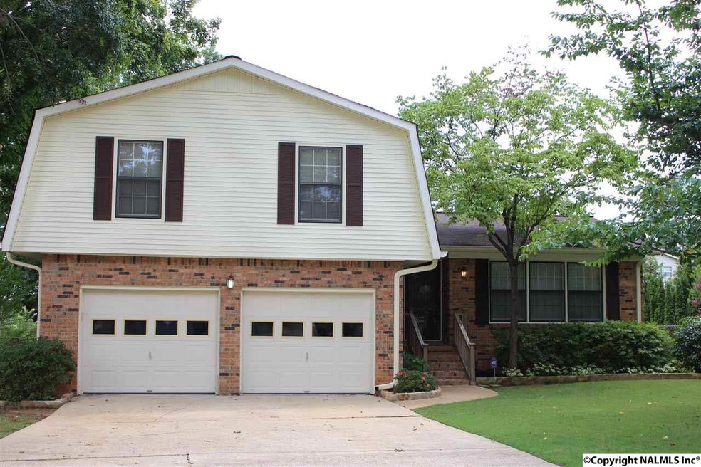 Tri level home located on private cul-de-sac