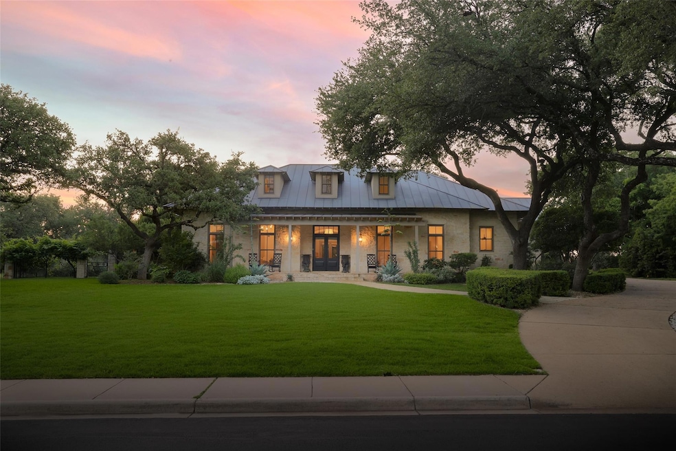 Modern farmhouse style home with a yard, covered 