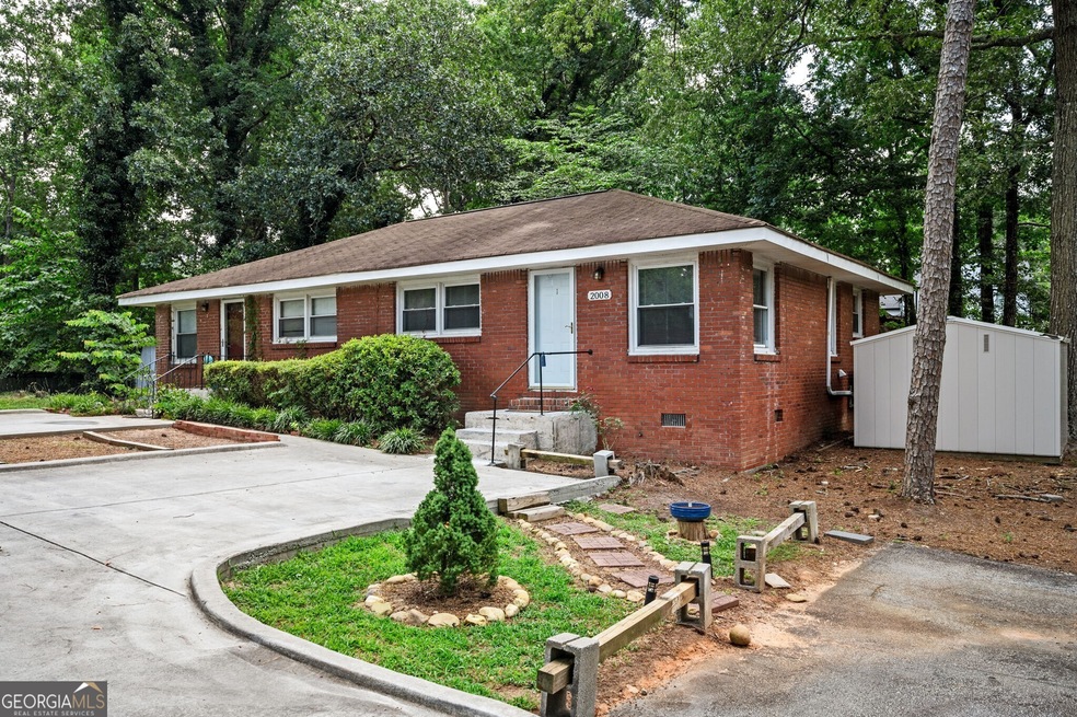 2008 McDaniels Bridge Rd SW, Lilburn, GA 30047 - photo 1