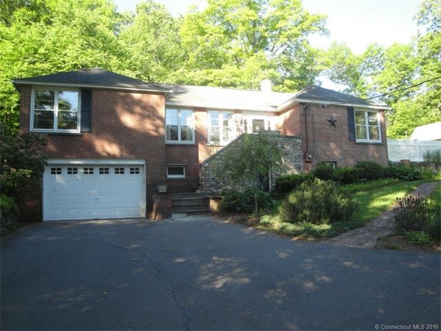 Take a look at this beautiful & unique brick ranch