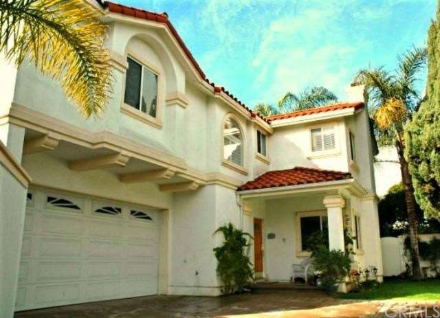 Detached Townhome on large lot with one other home