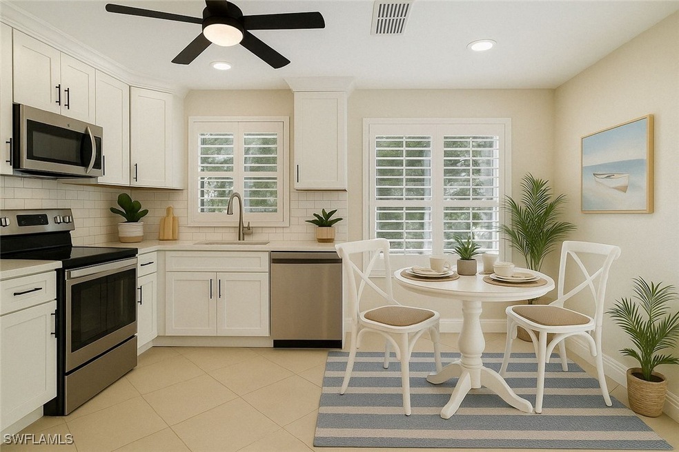 Kitchen with tasteful backsplash, a sink, light co