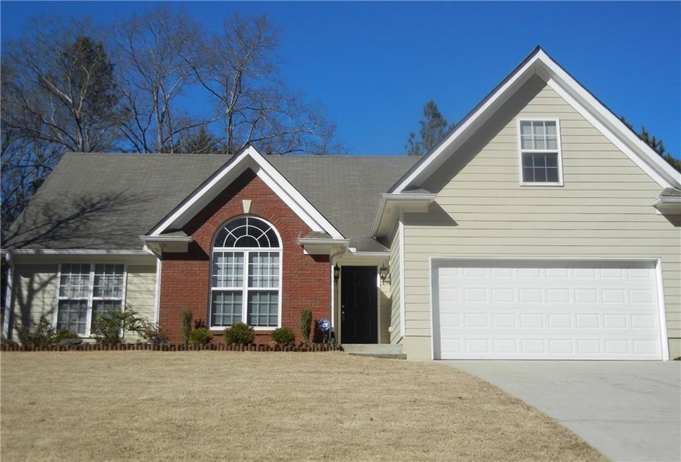 4 bedroom ranch on half acre fenced lot!