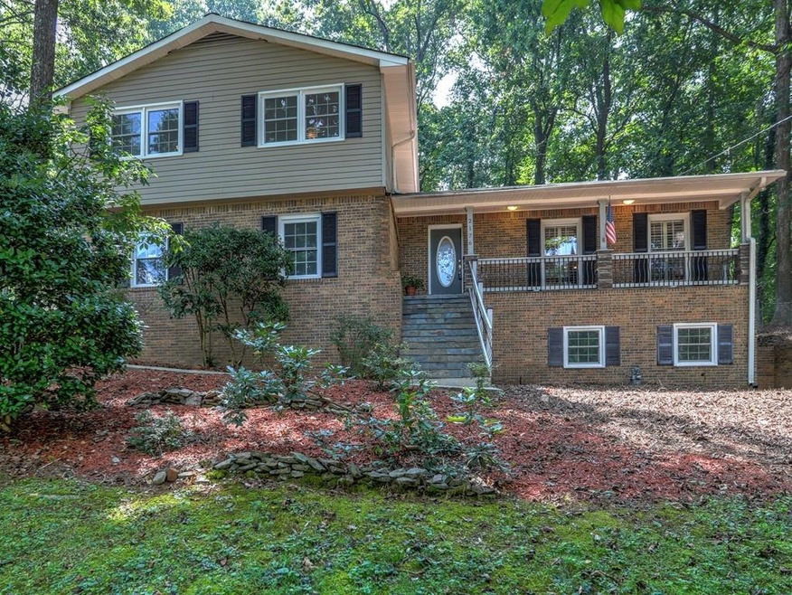 This beautiful updated home sits on over an acre p