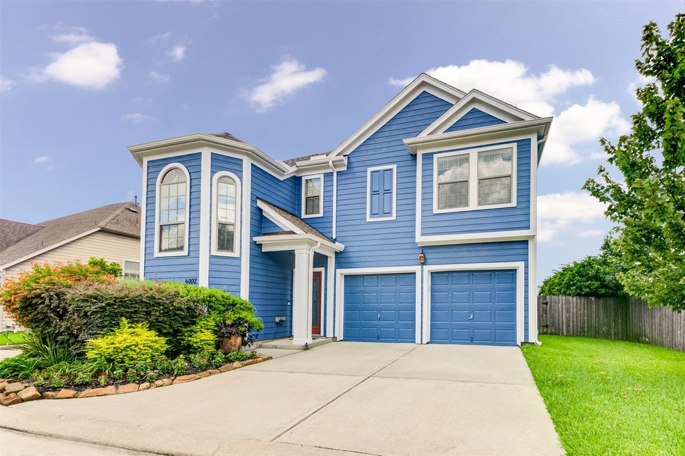 6002 Gilman Trace Ln, Houston, TX 77092 - photo 1