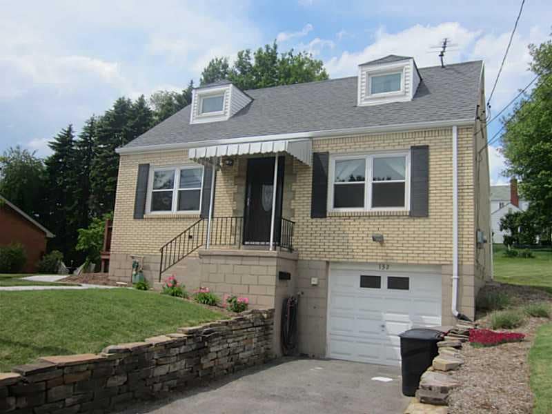 Exterior Front. Sitting pretty on this lovely stre