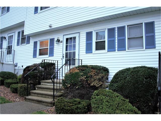 Neatly landscaped front entryway.