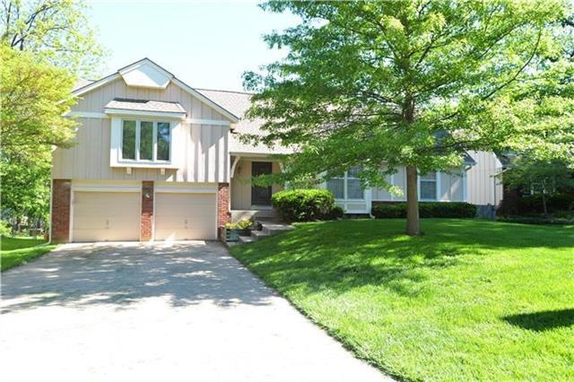 Beautiful shaded front lawn.