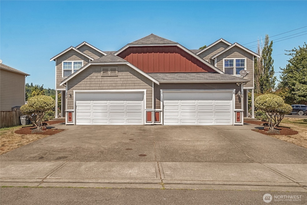 A well-maintained duplex with great curb appeal on an oversized lot.