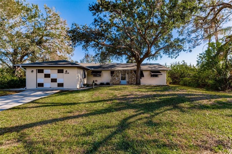 1019 Malay Terrace NW, Port Charlotte, FL 33948 - photo 1