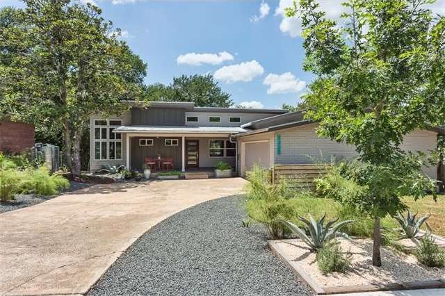 Front of home with Xeriscape landscape, vegetable 