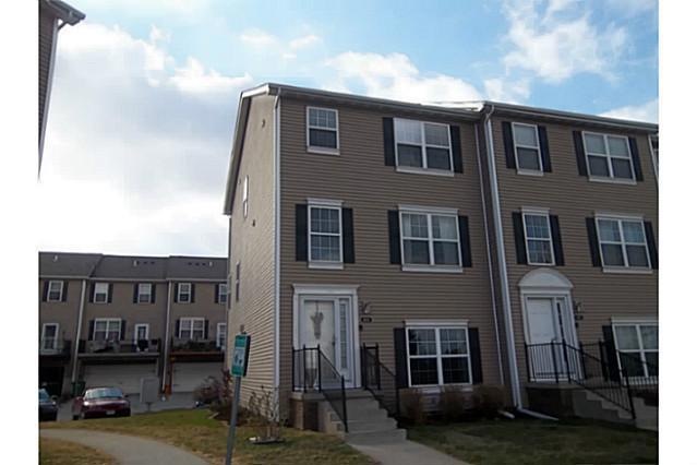 Exterior Front. Nice end unit means more light and