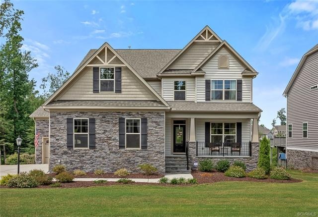 Exterior front featuring craftsman-inspired tapere