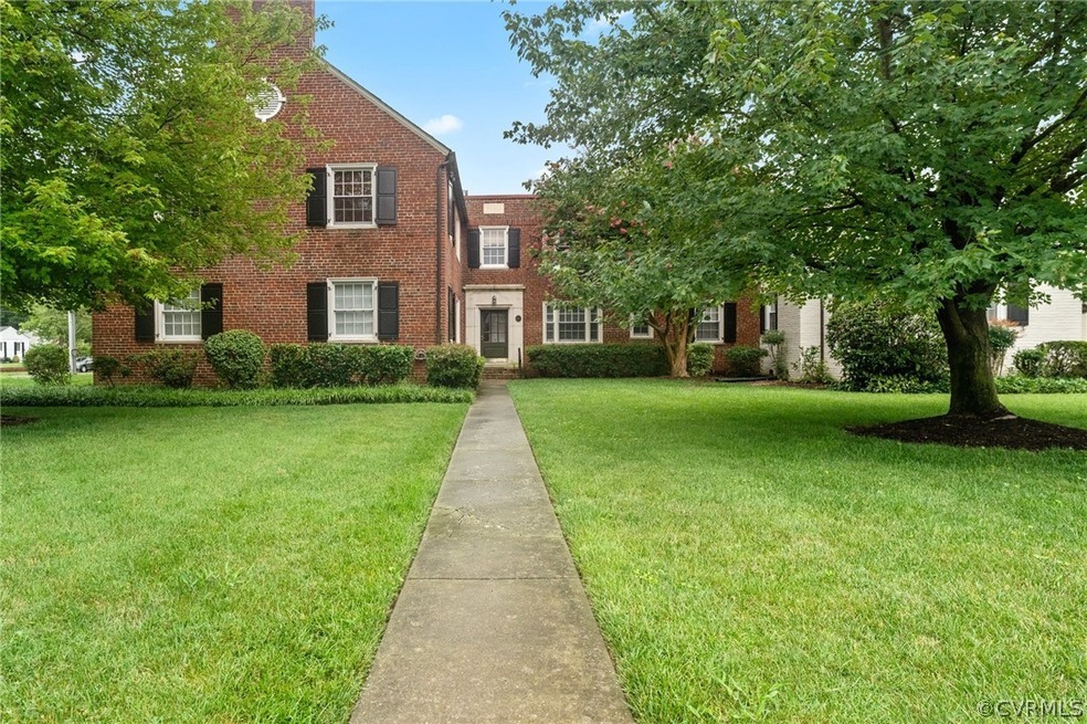 View of front of property featuring a front yard