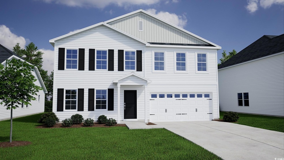 Colonial house with a garage, driveway, board and 