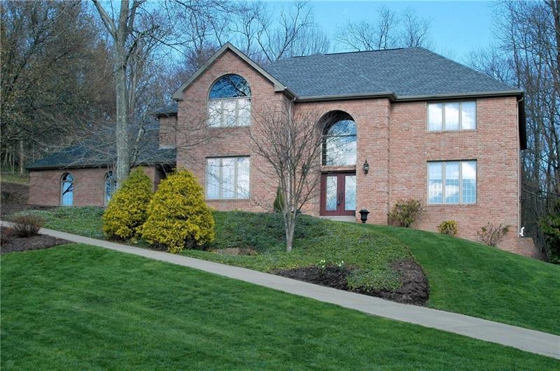 This gorgeous custom home in Pine-Richland school 