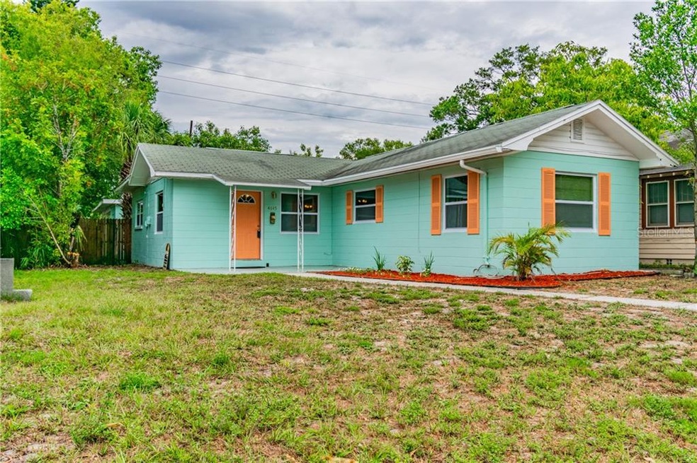 Solid block home on a cute red brick street.