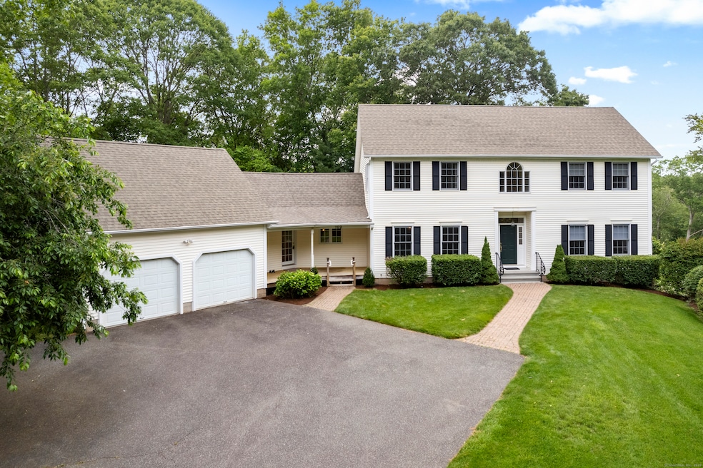 Welcome to this class colonial with an inviting front porch.