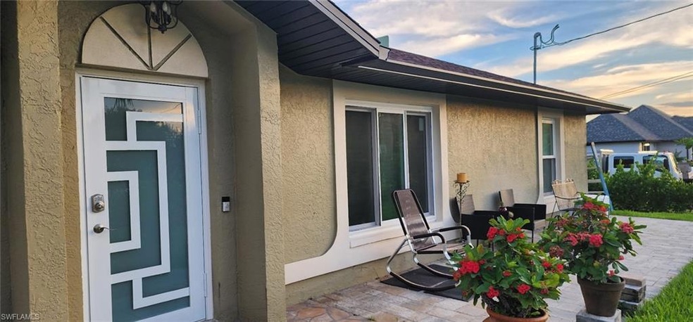 Stucco finished and fresh  exterior paint.