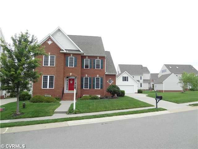 Exterior Front - Corner lot, huge side yard, brick