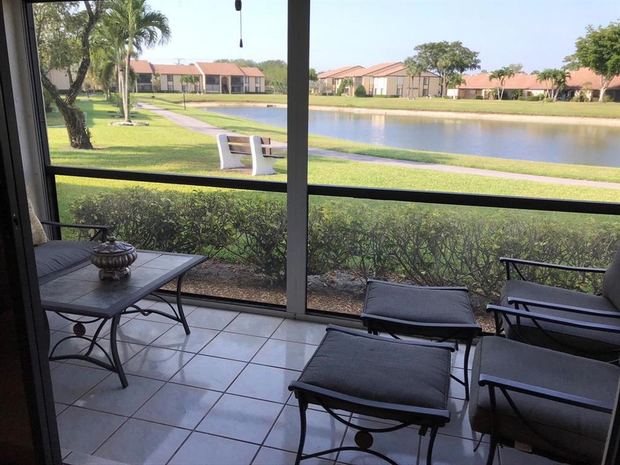 Covered & screened patio with lake view
