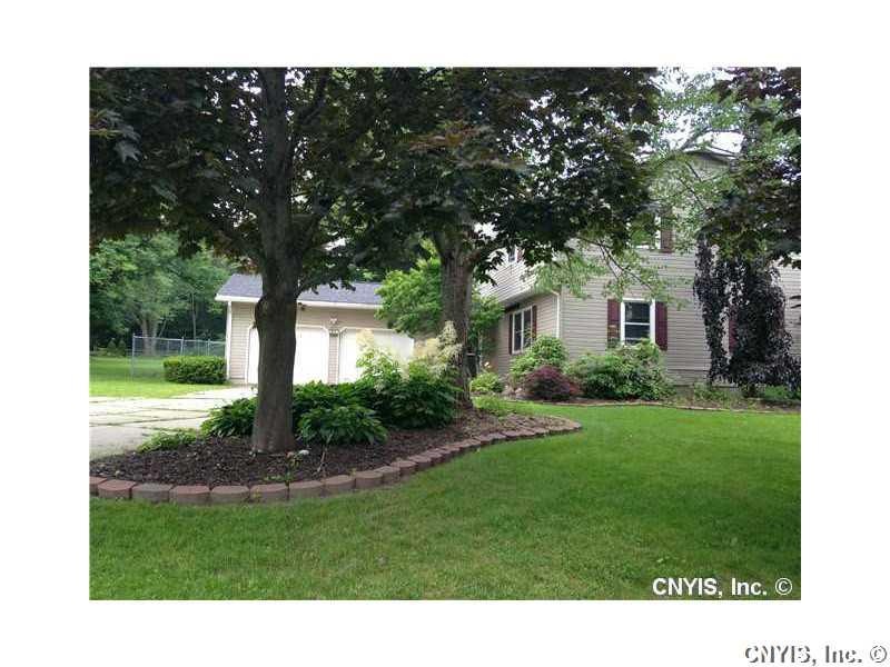 Exterior Front. Front of Home, nicely landscaped, 