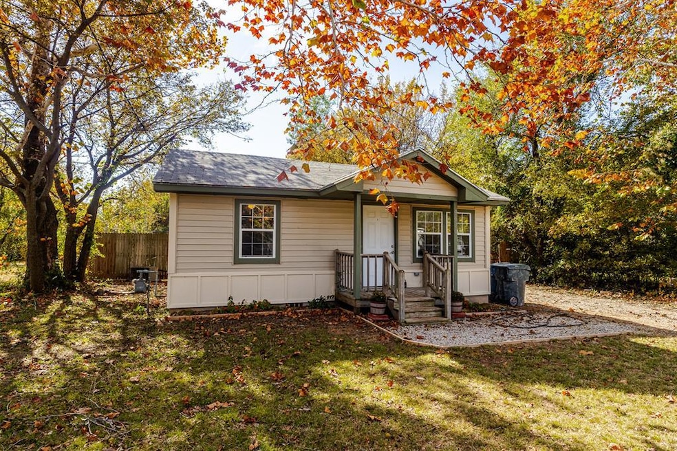 Bungalow-style house featuring roof with shingles