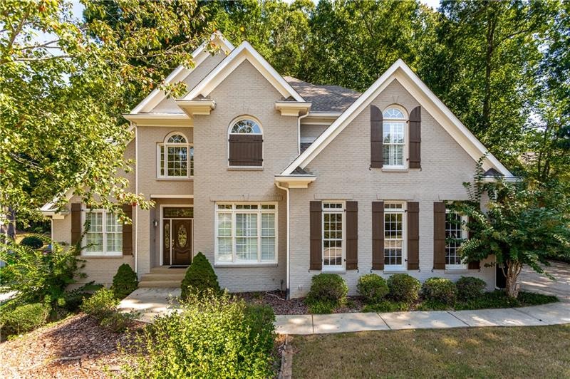 Elegantly Painted Front Brick Beauty!! Situated in