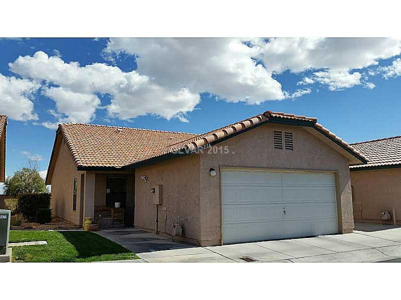Property Photo. Single Story town house with a 2 c