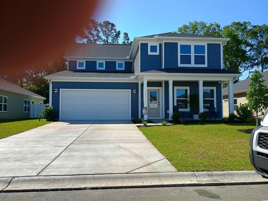 View of front of house featuring a porch, concrete