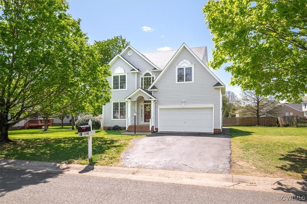 Front of House, Garage, Driveway, Yard